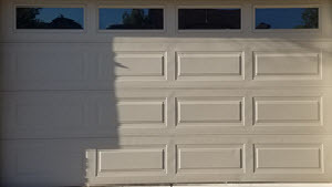 Fix and replace garage door panels